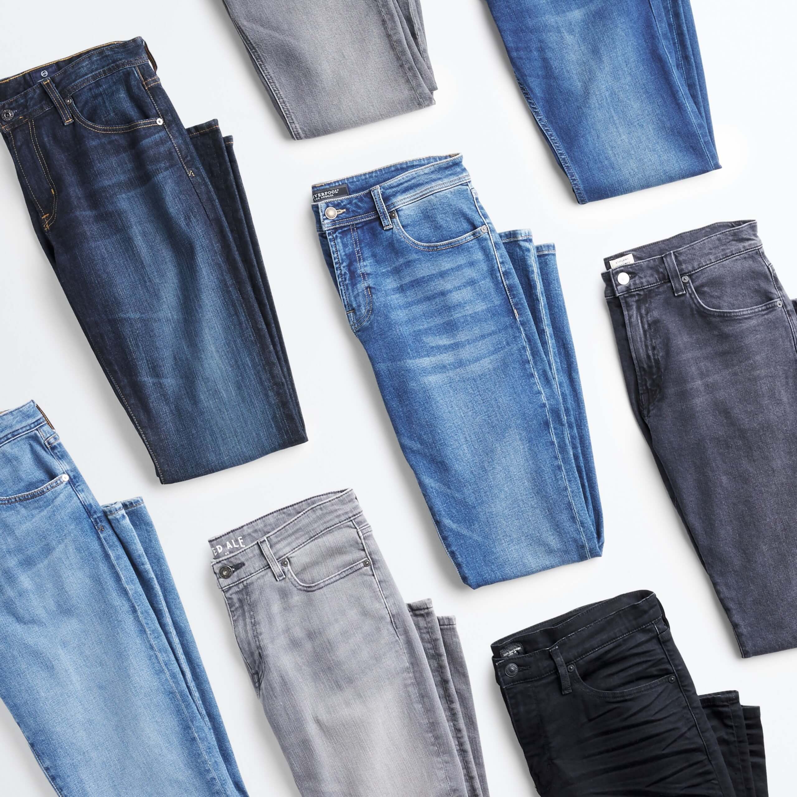 Stitch Fix Men’s outfit laydown featuring jeans in dark blue wash, grey, black and light blue.