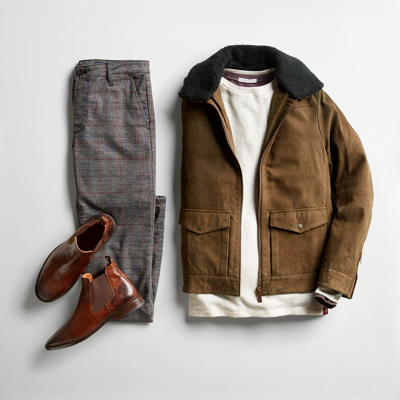 shearling jacket and grey pants