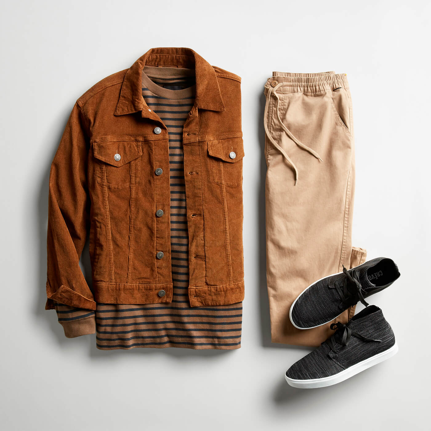 tan corduroy jacket and beige denim