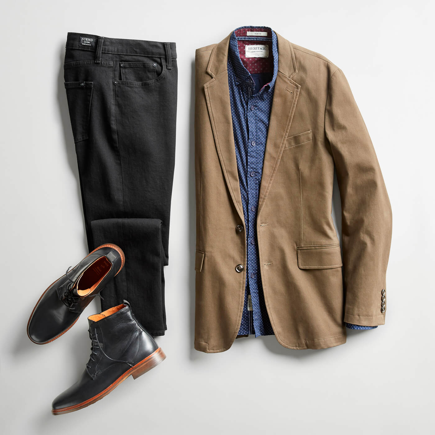 tan blazer and black boots