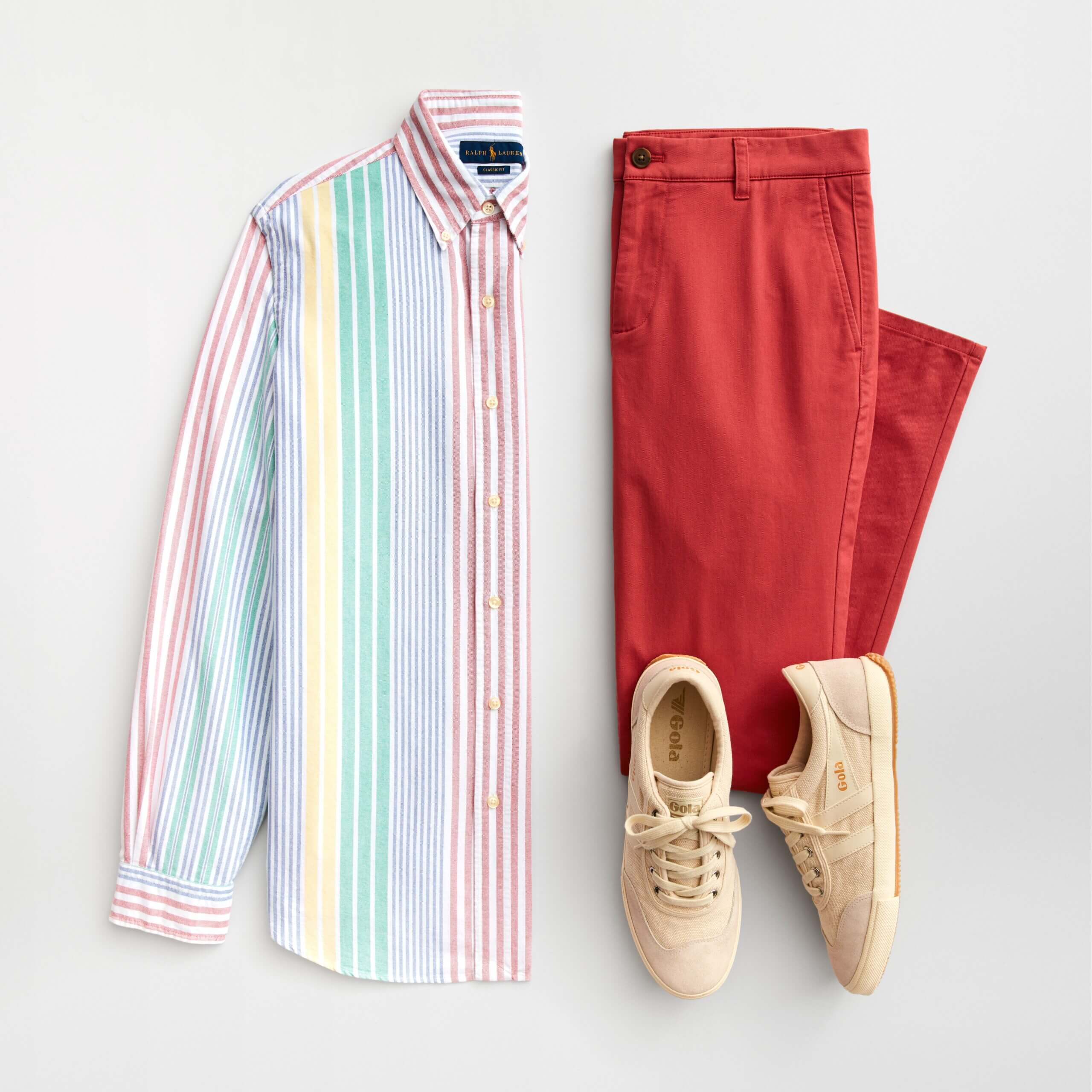Stitch Fix men's outfit laydown featuring red chinos, beige sneakers and striped oxford shirt in red, green, yellow and white. 