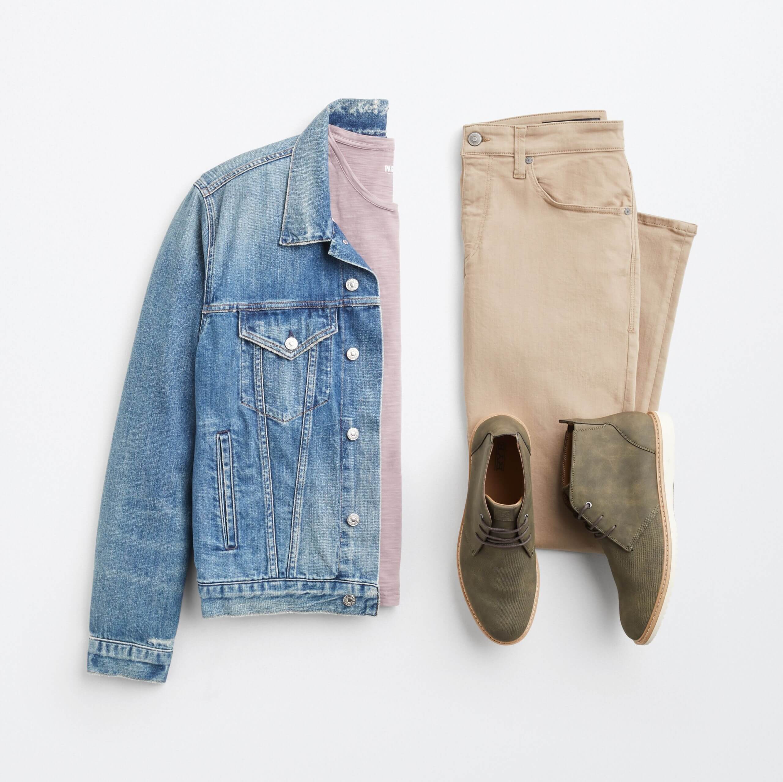 Stitch Fix men's outfit laydown featuring a denim jacket over a rose tee, khaki jeans and taupe chukkas.