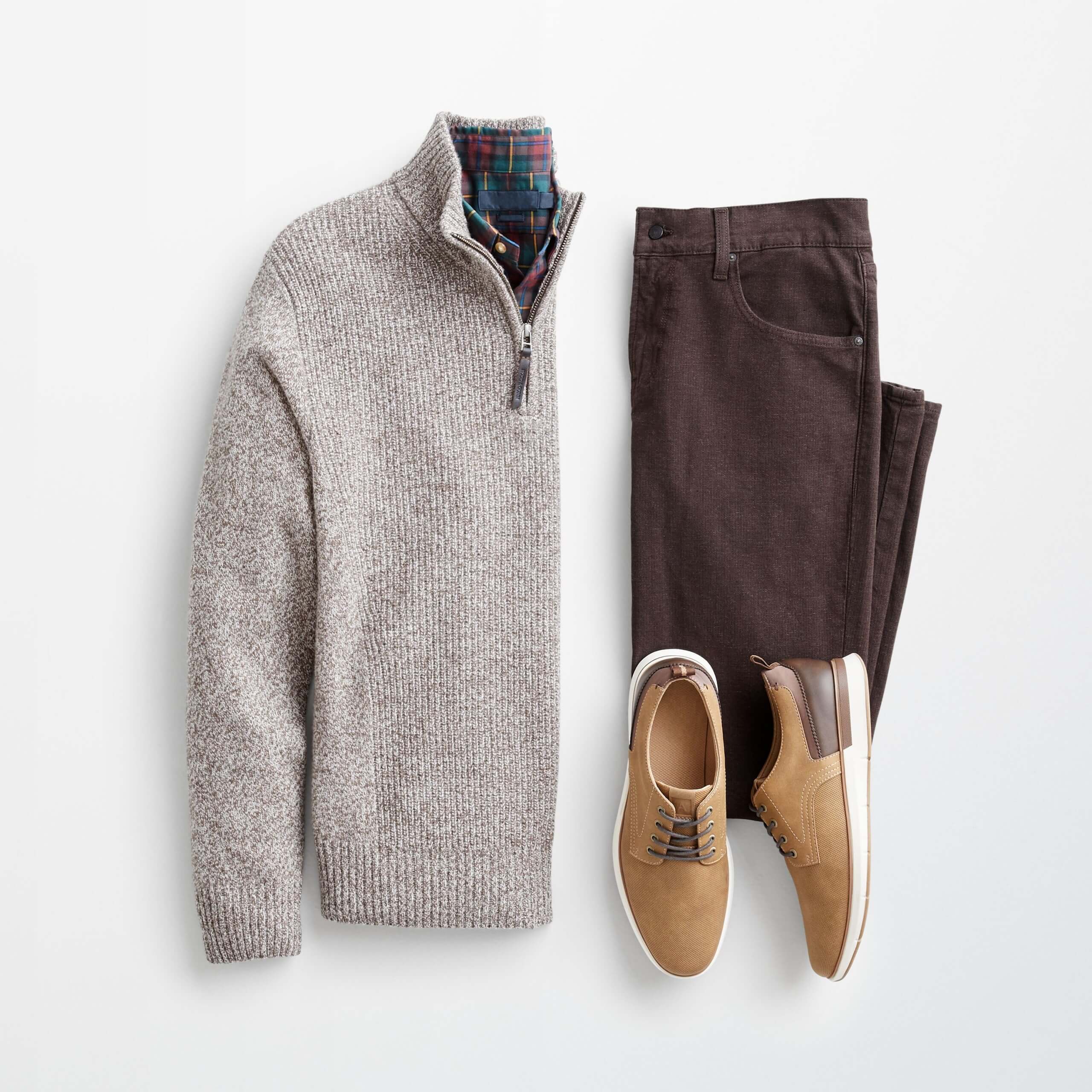 Stitch Fix Men’s outfit laydown featuring tan sweater, brown pants and tan derby shoes.