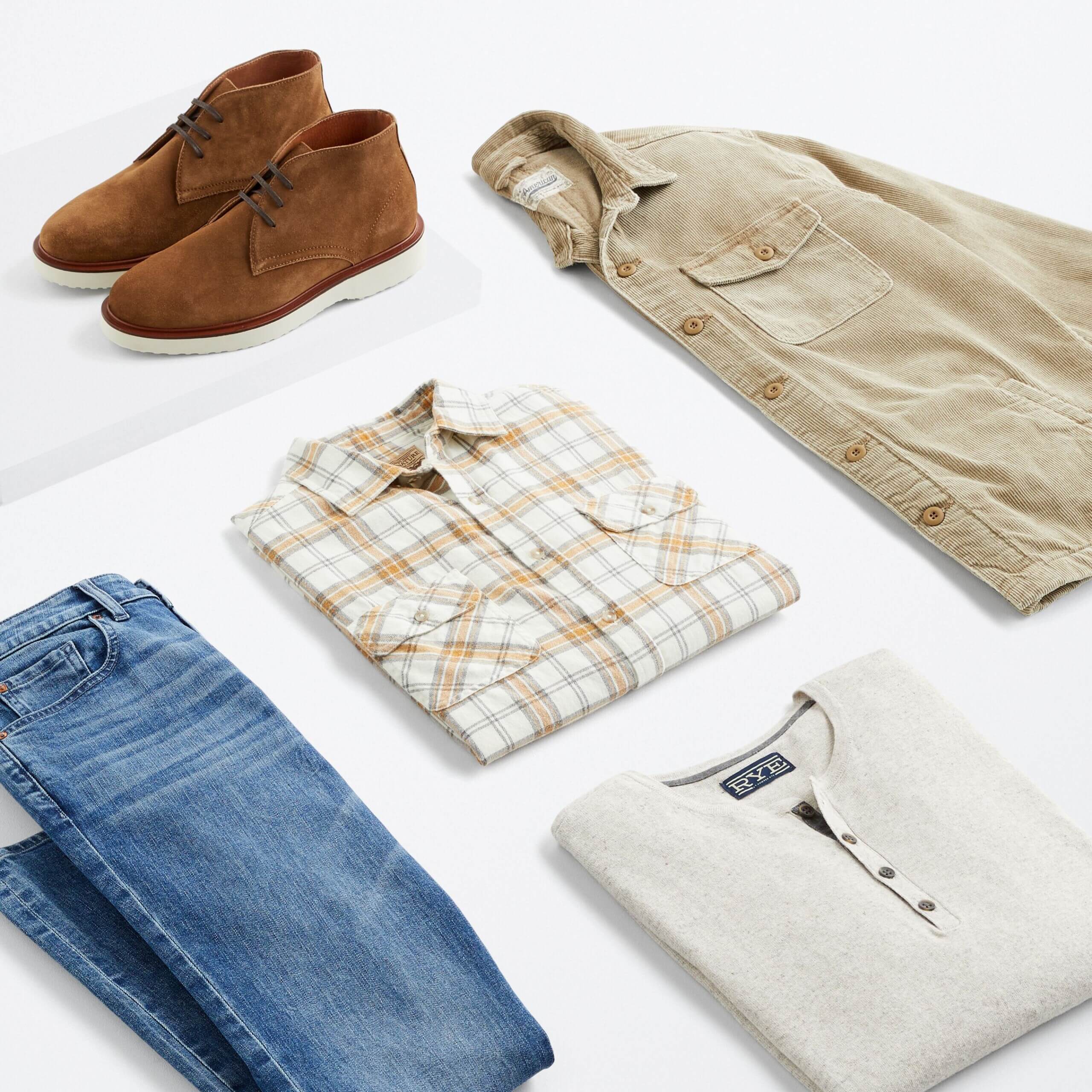 Stitch Fix men's outfit laydown featuring blue jeans, cream henley, plaid button-down, beige cord jacket and tan chukka boots. 