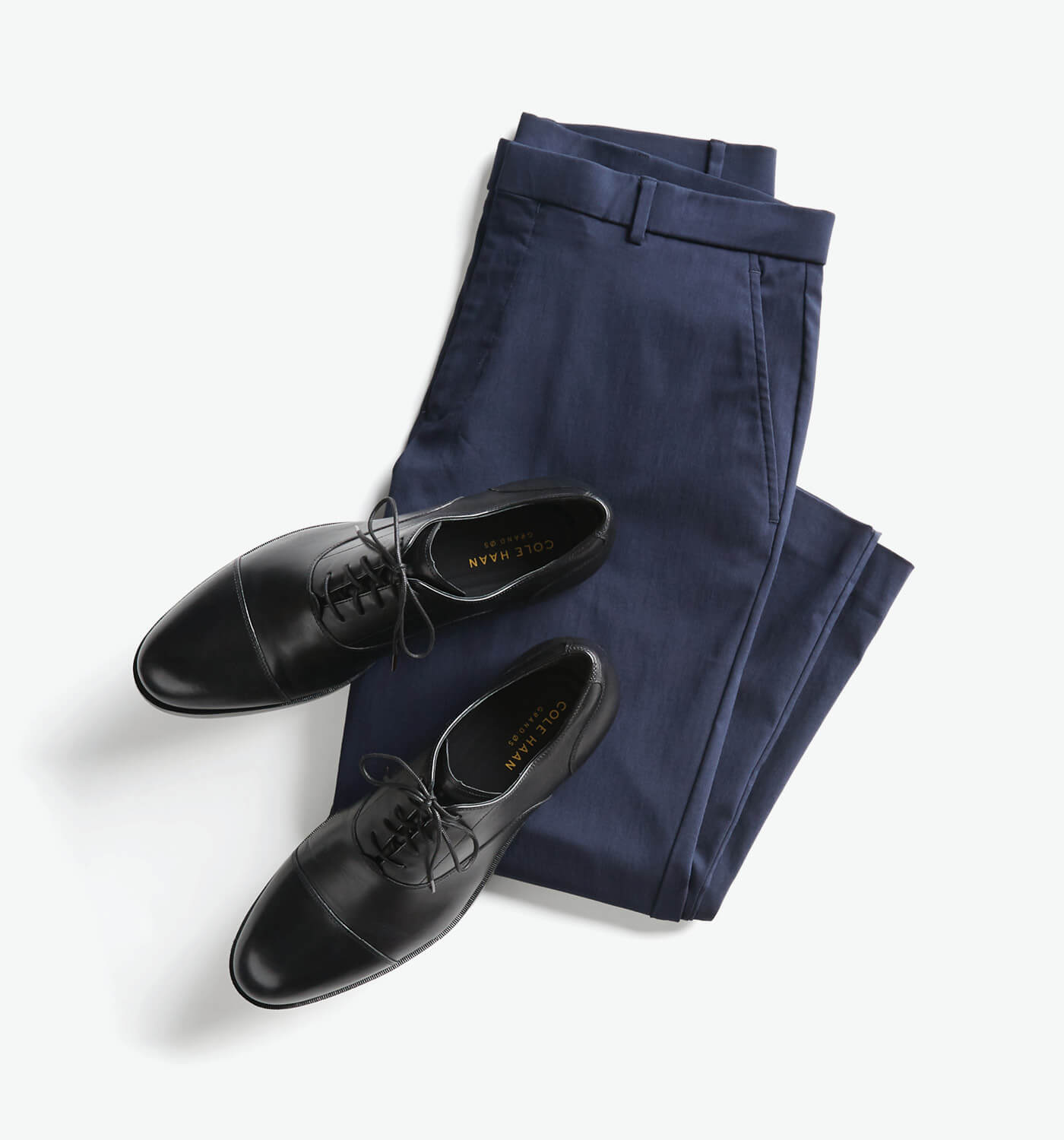 Can I wear navy with black?
