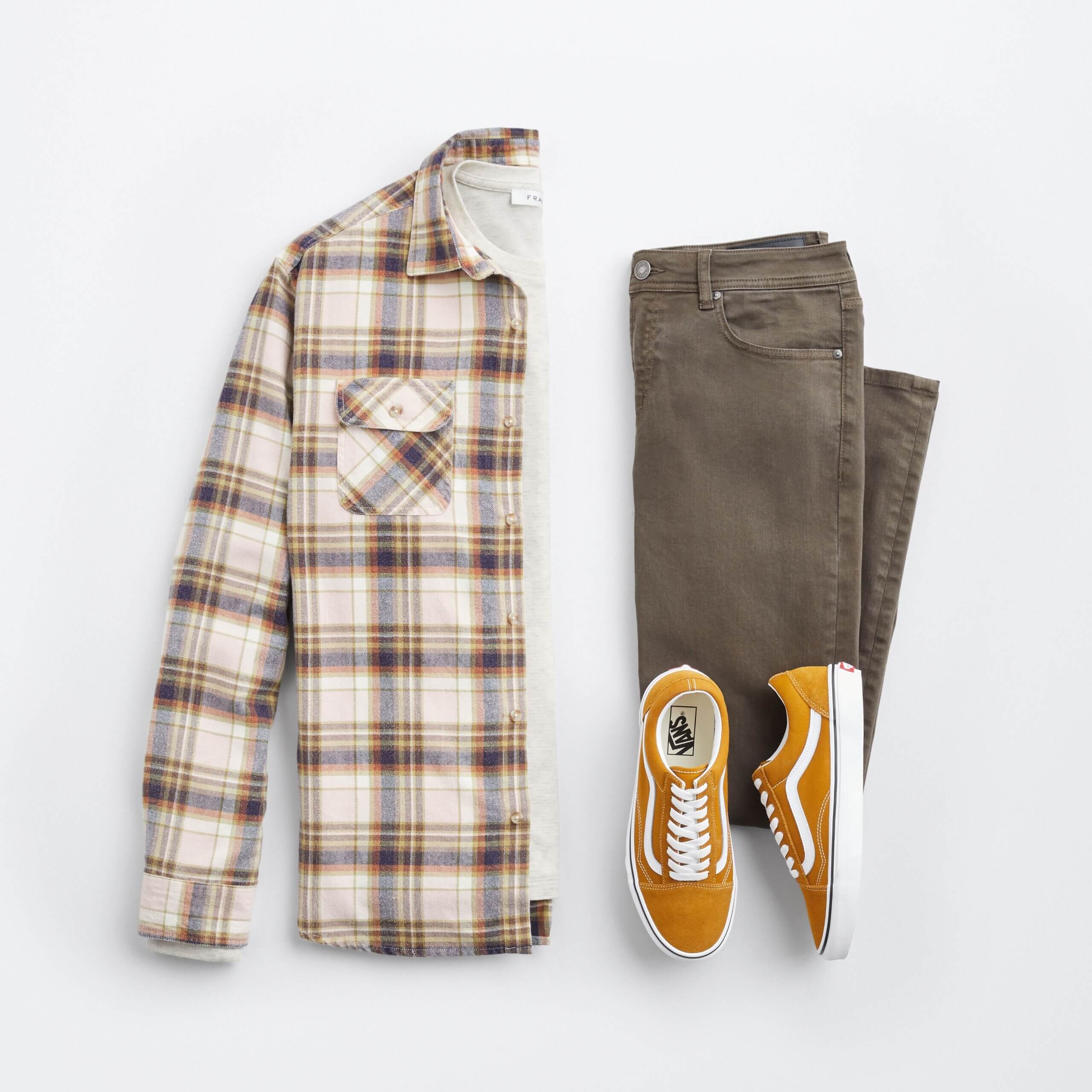 Stitch Fix men's outfit laydown featuring flannel shirt, olive jeans and mustard sneakers.