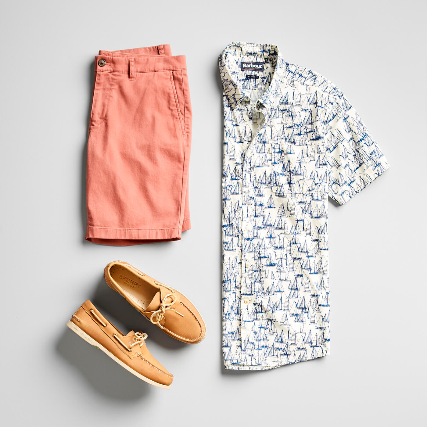 pink shorts and printed short sleeve button-up