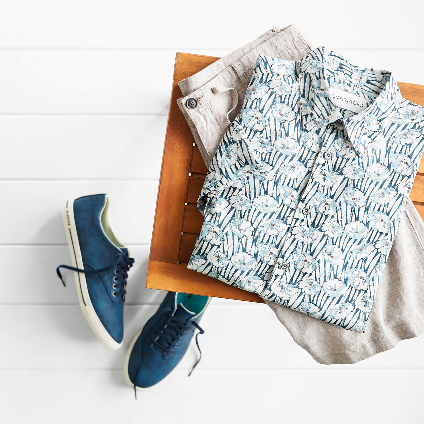 mens blue sneakers and blue floral shirt