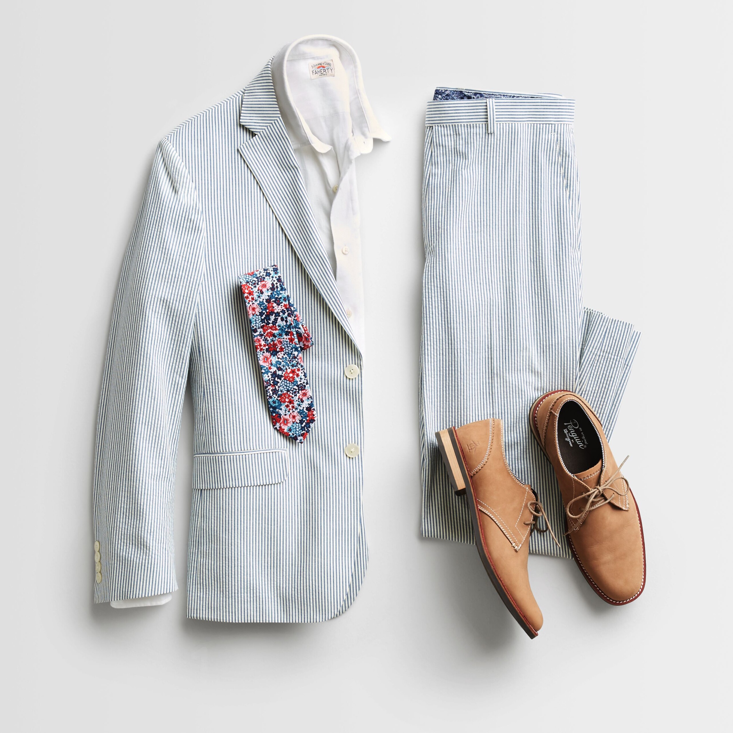 Stitch Fix Men’s microfloral tie accessorizes a seersucker suit, white button-down dress shirt.