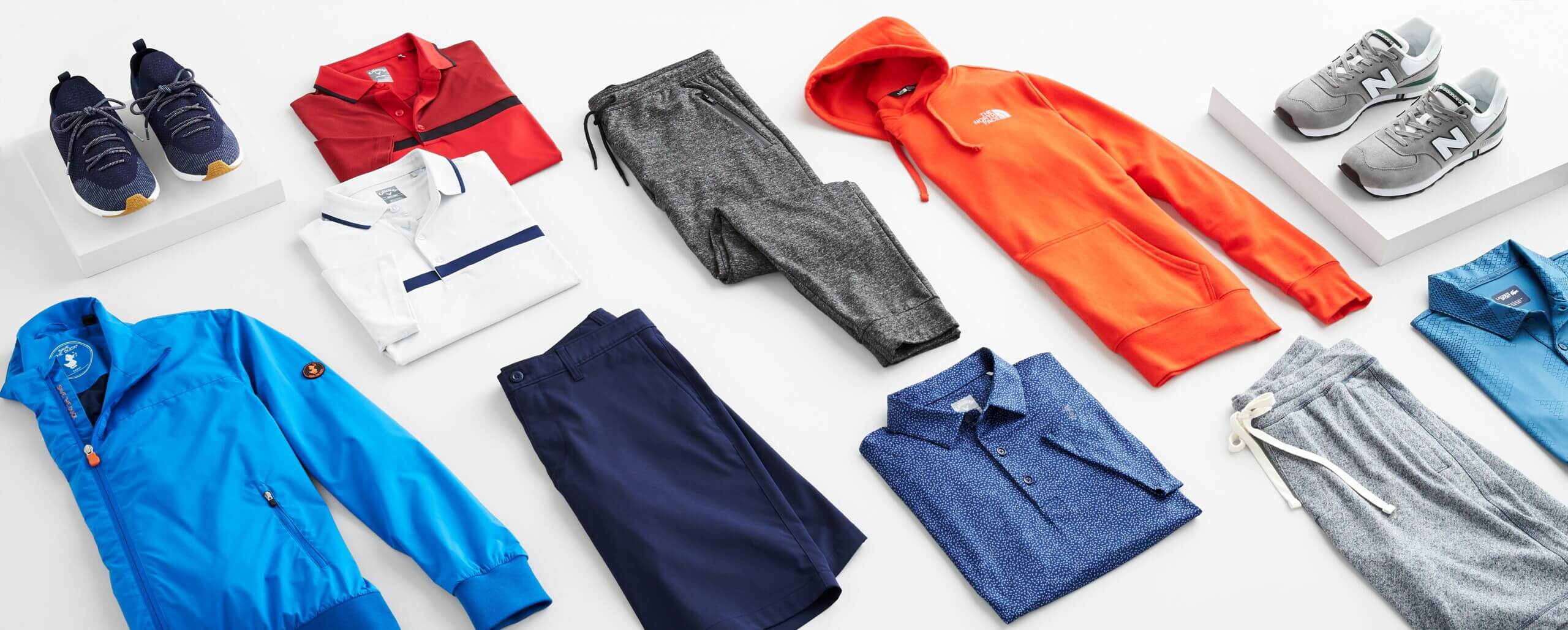 Stitch Fix navy runners, blue packable shell, white and red polo, navy shorts, grey joggers, grey shorts and grey sneakers.