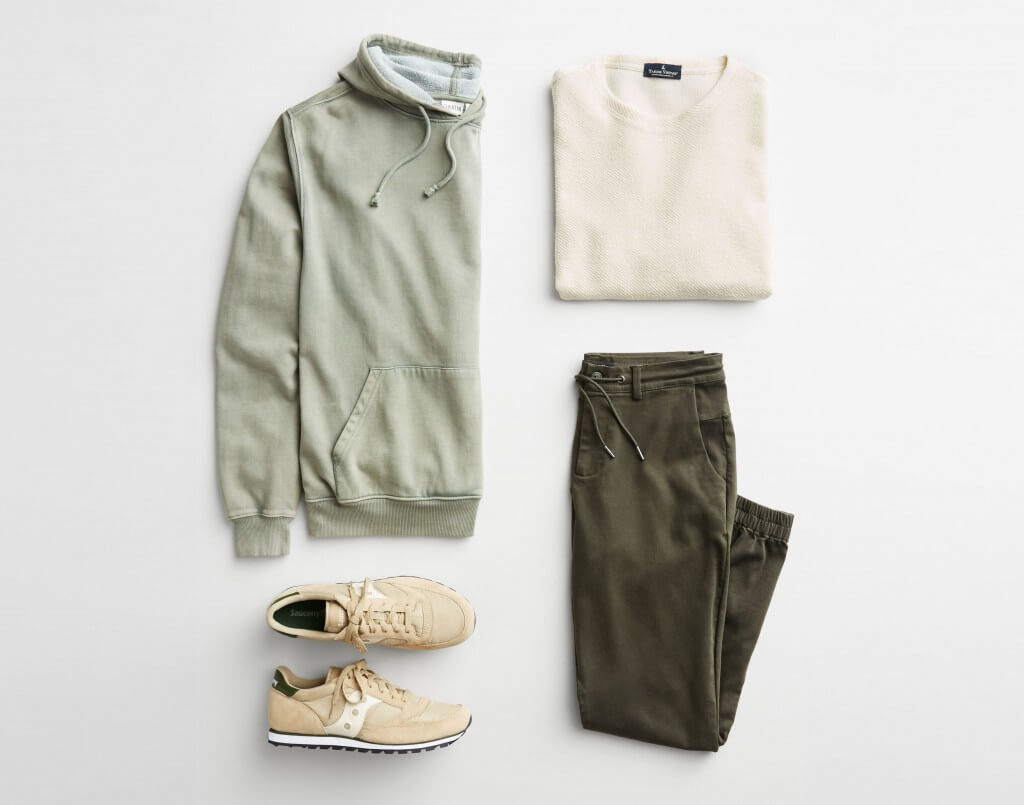 Stitch Fix men’s outfit laydown featuring light green hoodie, beige T-shirt, olive joggers and tan sneakers.