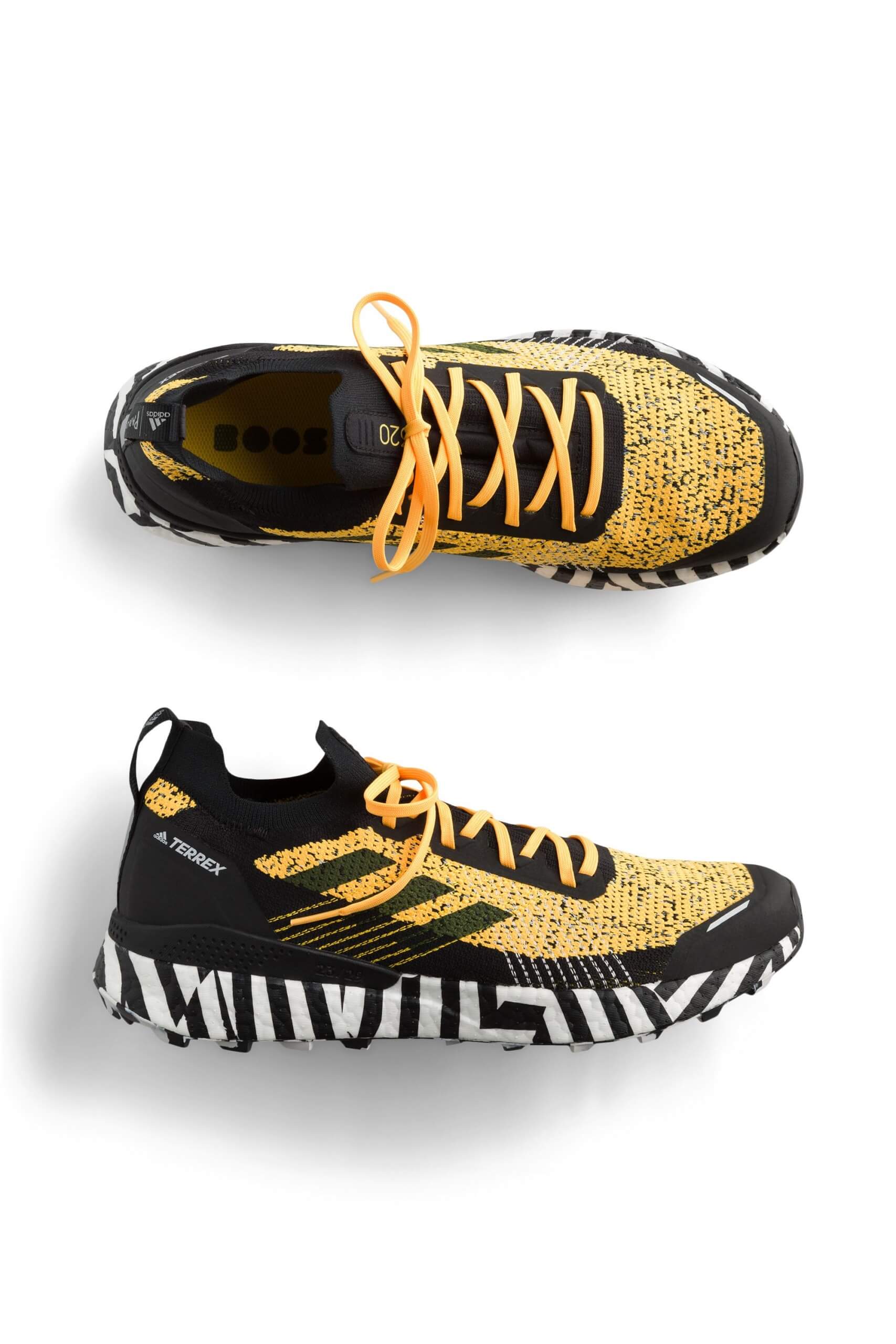 Stitch Fix men’s yellow, black and white athletic sneakers.
