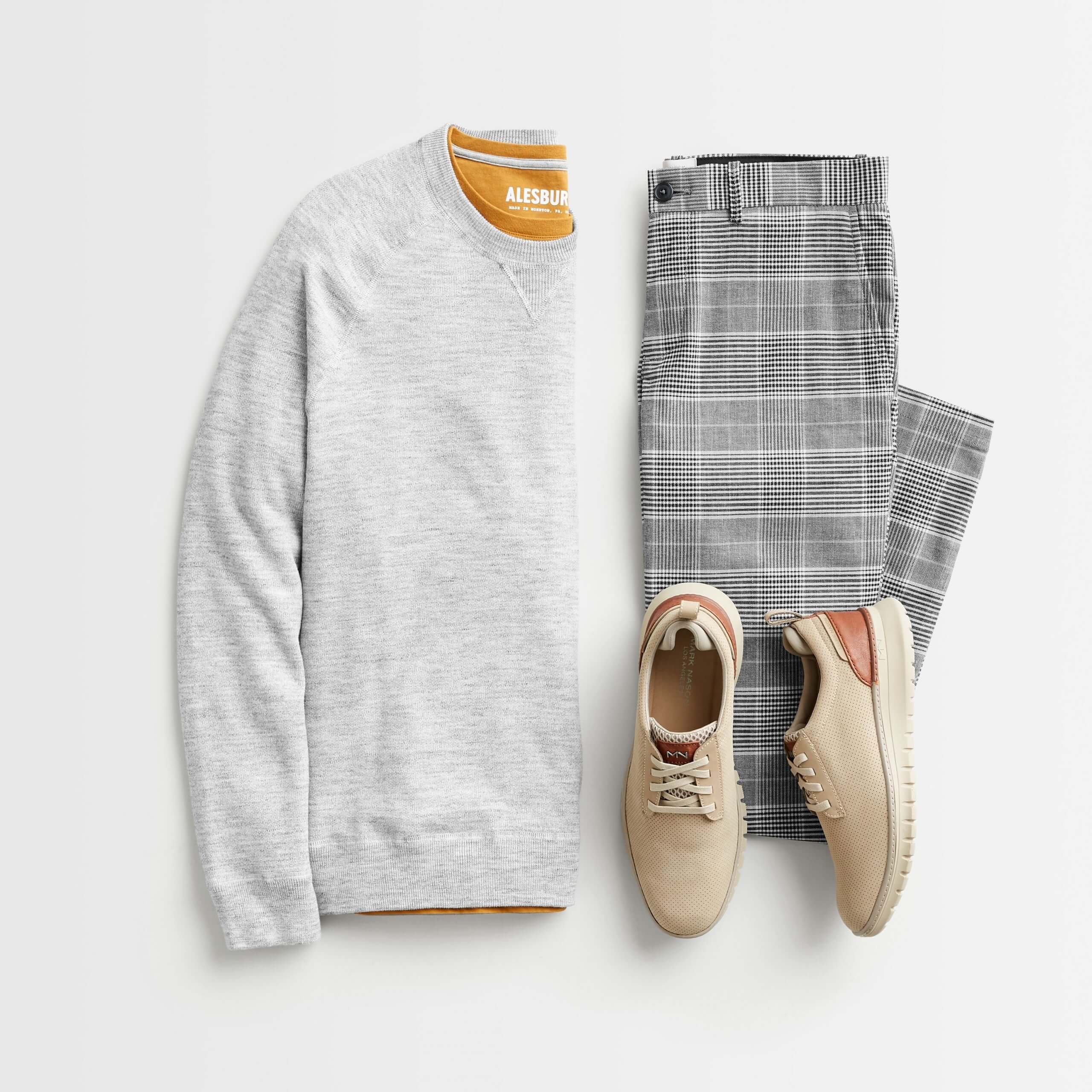 Stitch Fix men’s outfit laydown featuring grey sweatshirt over mustard shirt, plaid grey pants and beige shoes.