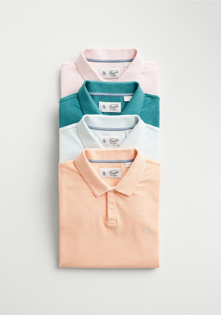Stitch Fix men’s polo shirts stacked in pastel pink, teal, white and light orange.