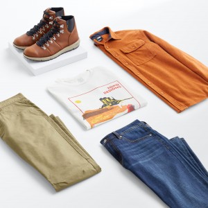 Stitch Fix Men’s Bohemian style outfit laydown with blue jeans, olive pants, graphic T-shirt, burnt orange shirt jacket and brown leather boots.