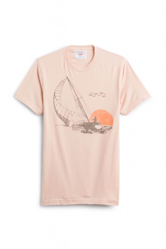 Stitch Fix Men’s pink graphic tee with a sail boat and setting sun.