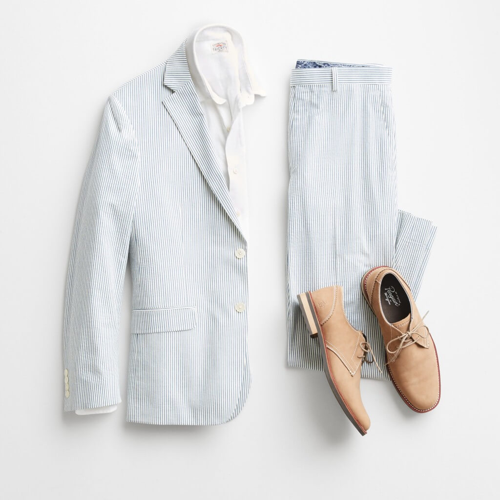 Stitch Fix men’s cocktail attire laydown with seersucker blazer, white button-down shirt, seersucker pants and brown shoes.