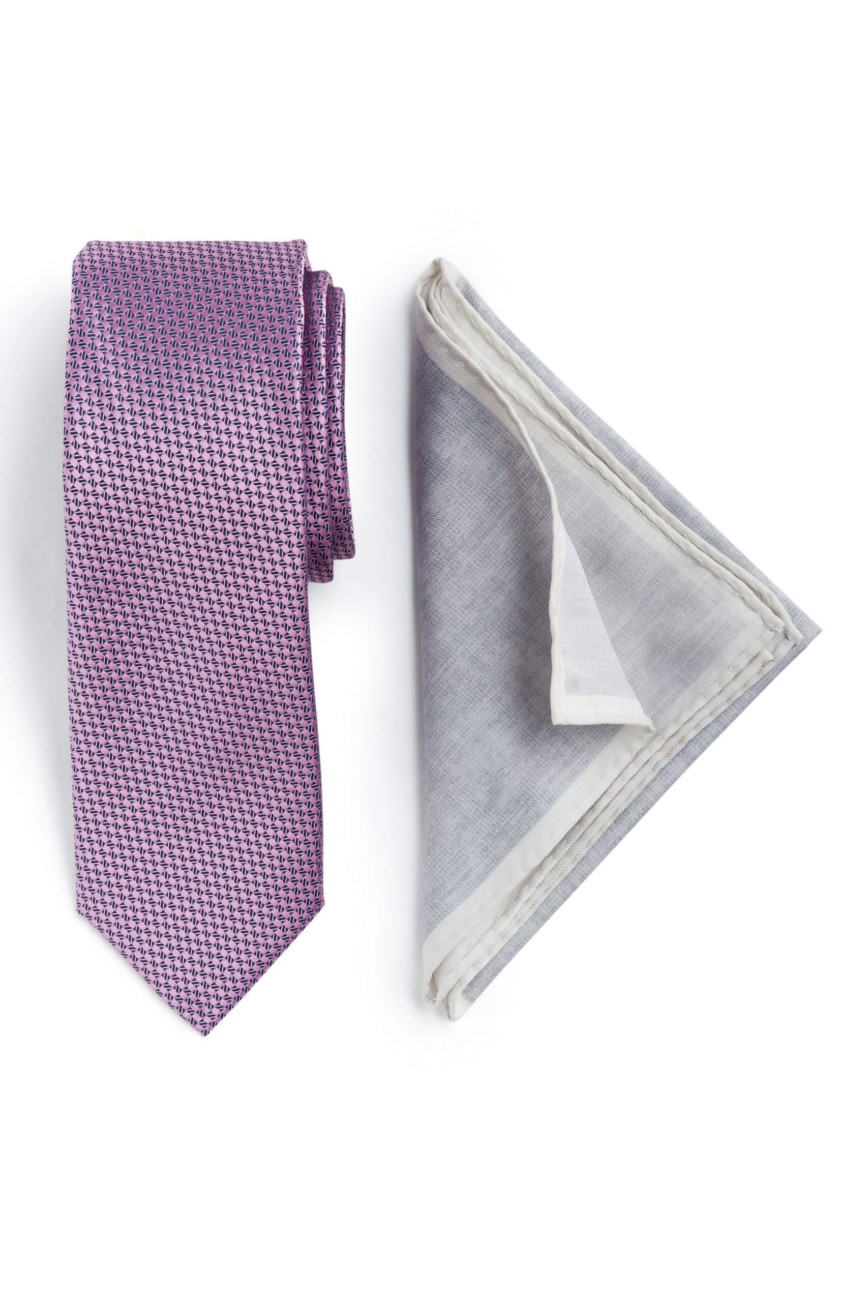 Stitch Fix men’s purple geometric print tie and gray pocket square.