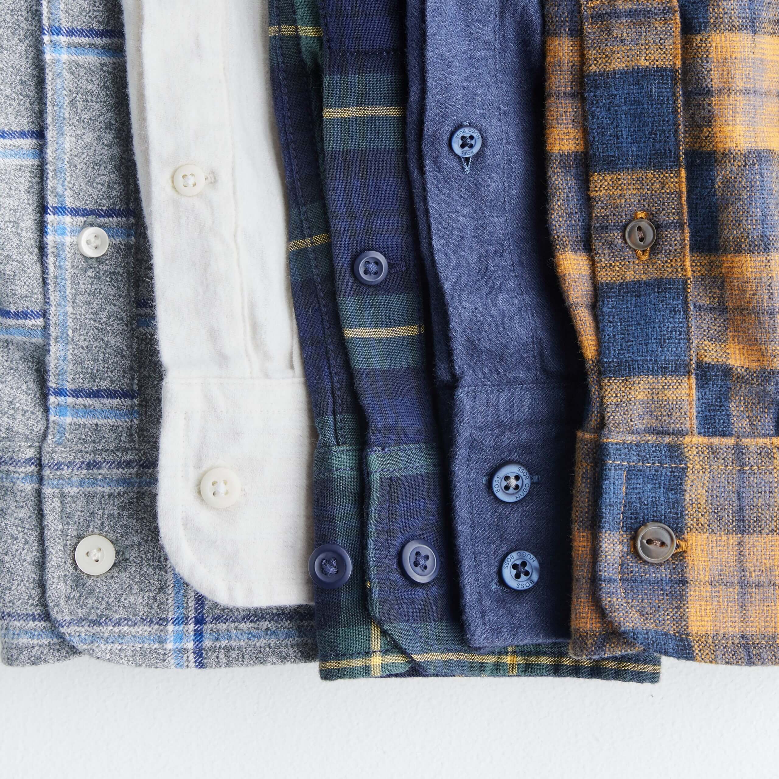 Stitch Fix men’s assorted plaid flannel sleeves.