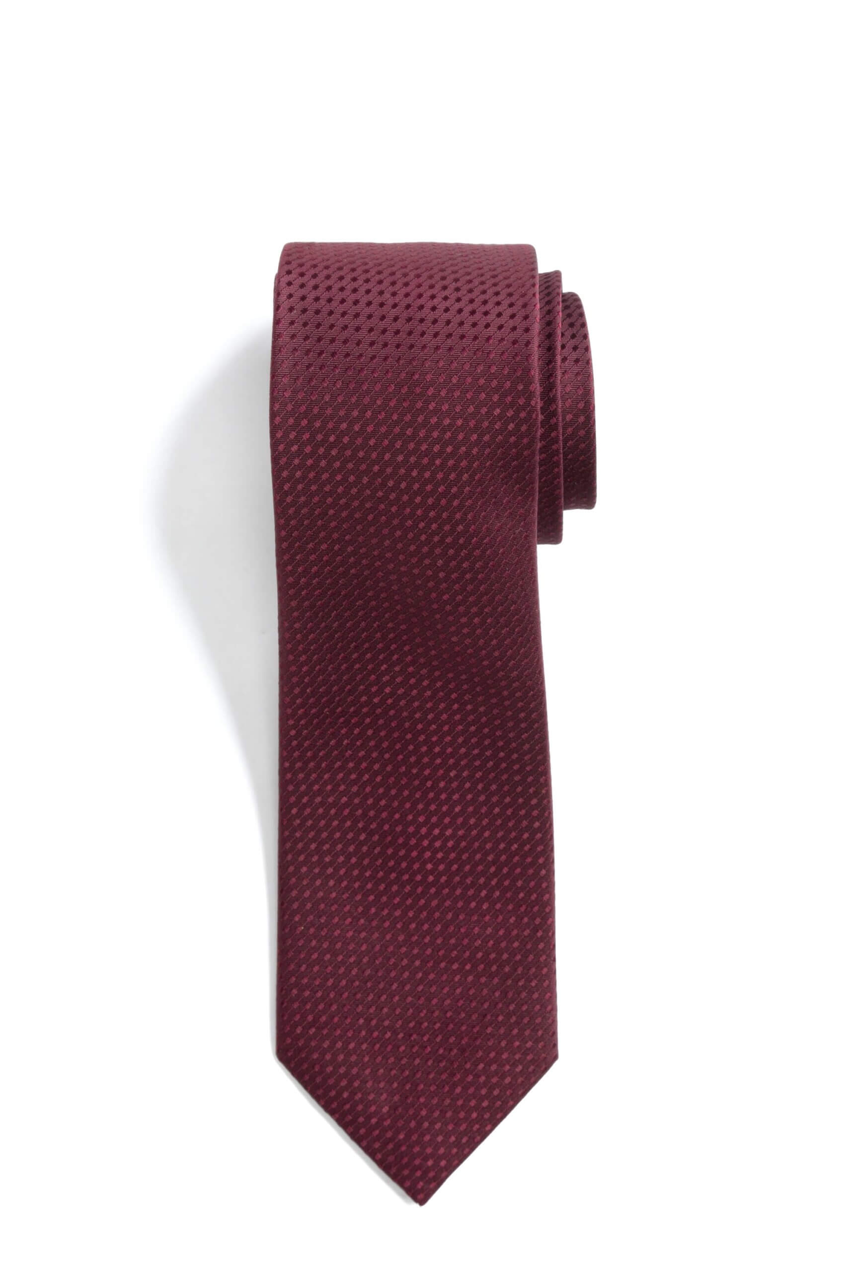 Stitch Fix men’s burgundy necktie wound up.