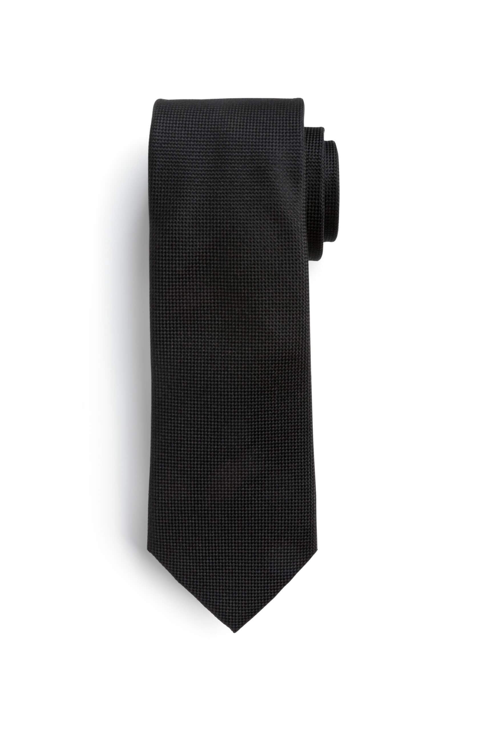 Stitch Fix men’s black necktie wound up.