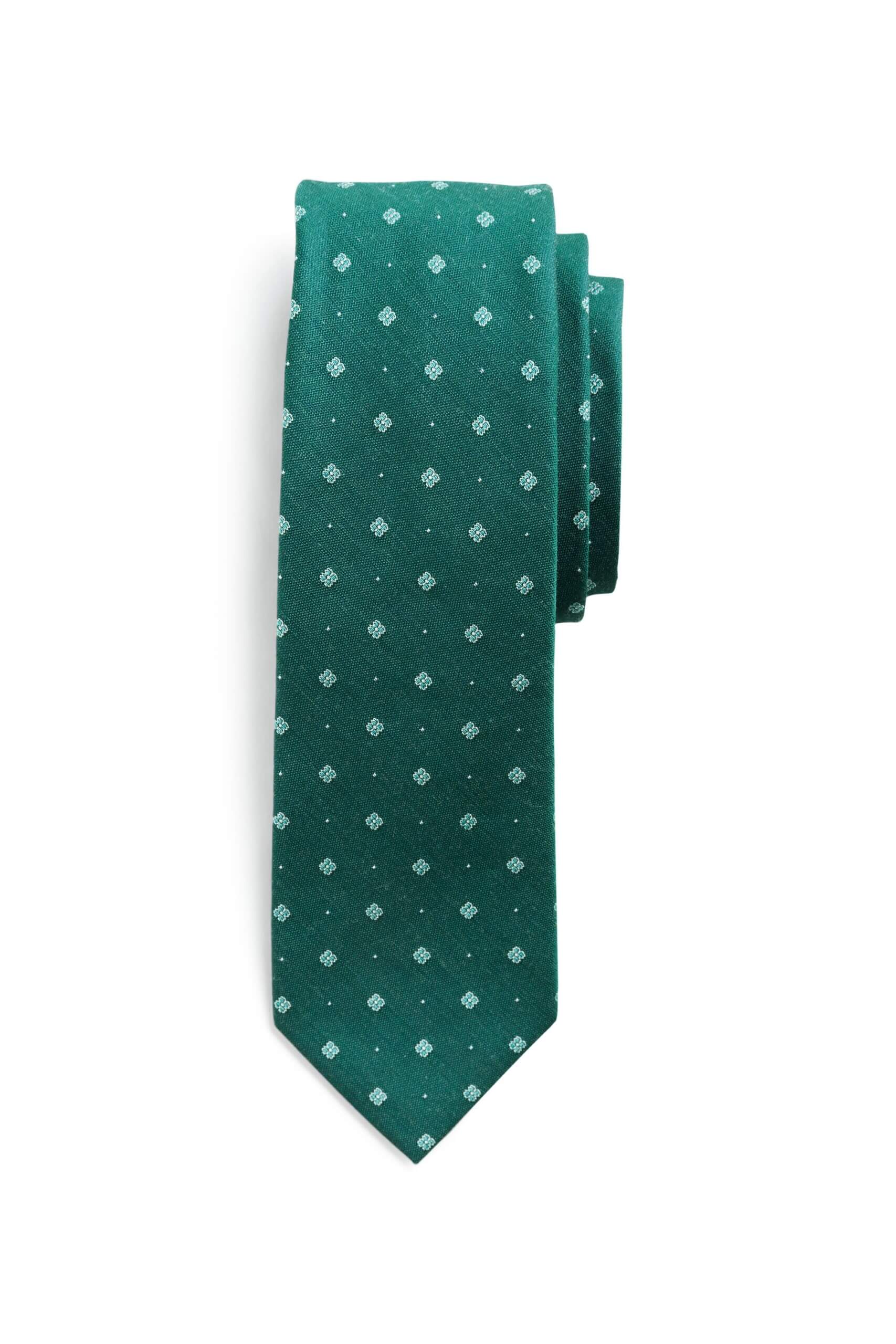 Stitch Fix men’s green geometric and polka dot necktie wound up.