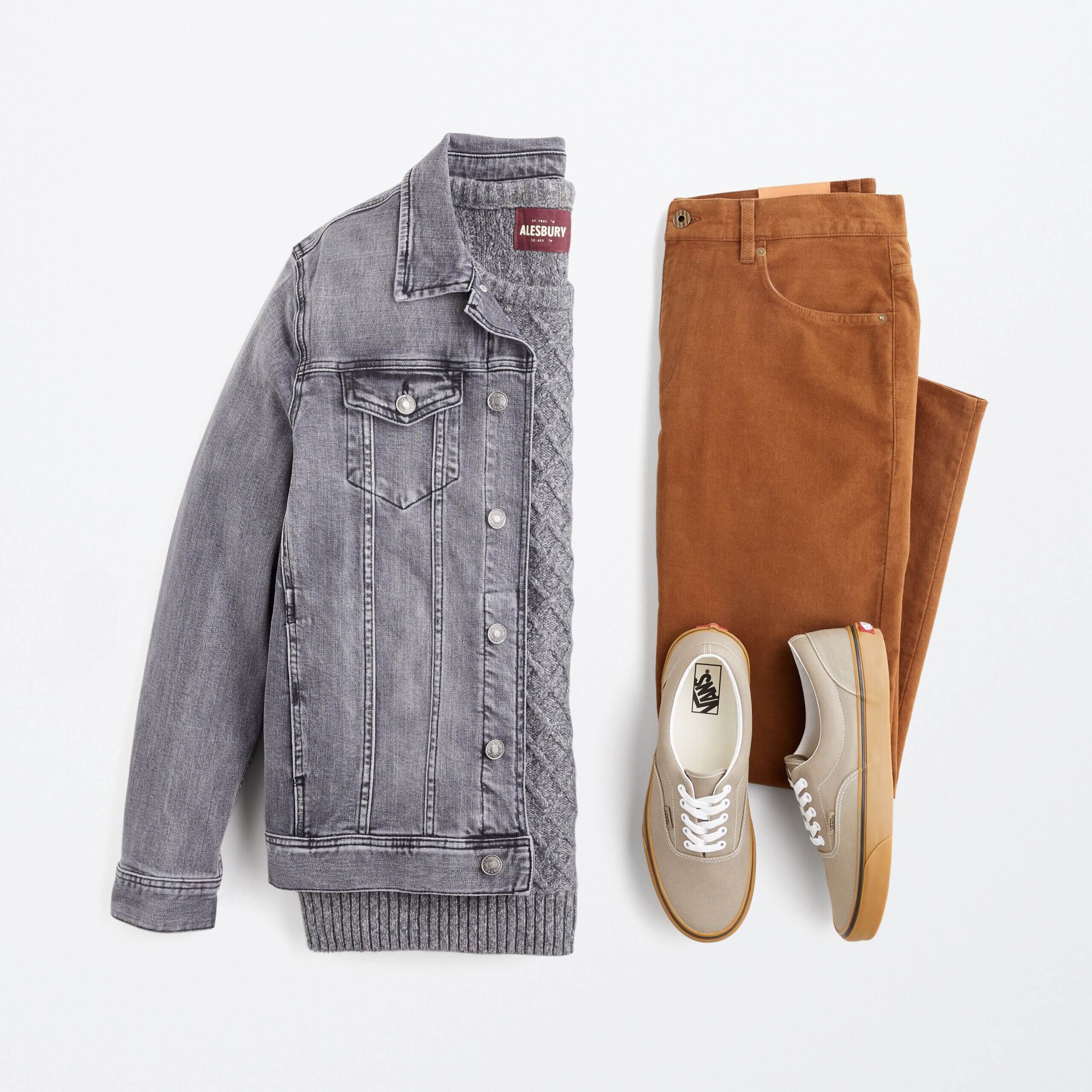 Stitch Fix men’s big and tall outfit with grey cable-knit sweater, grey denim jacket, brown cords and grey sneakers.
