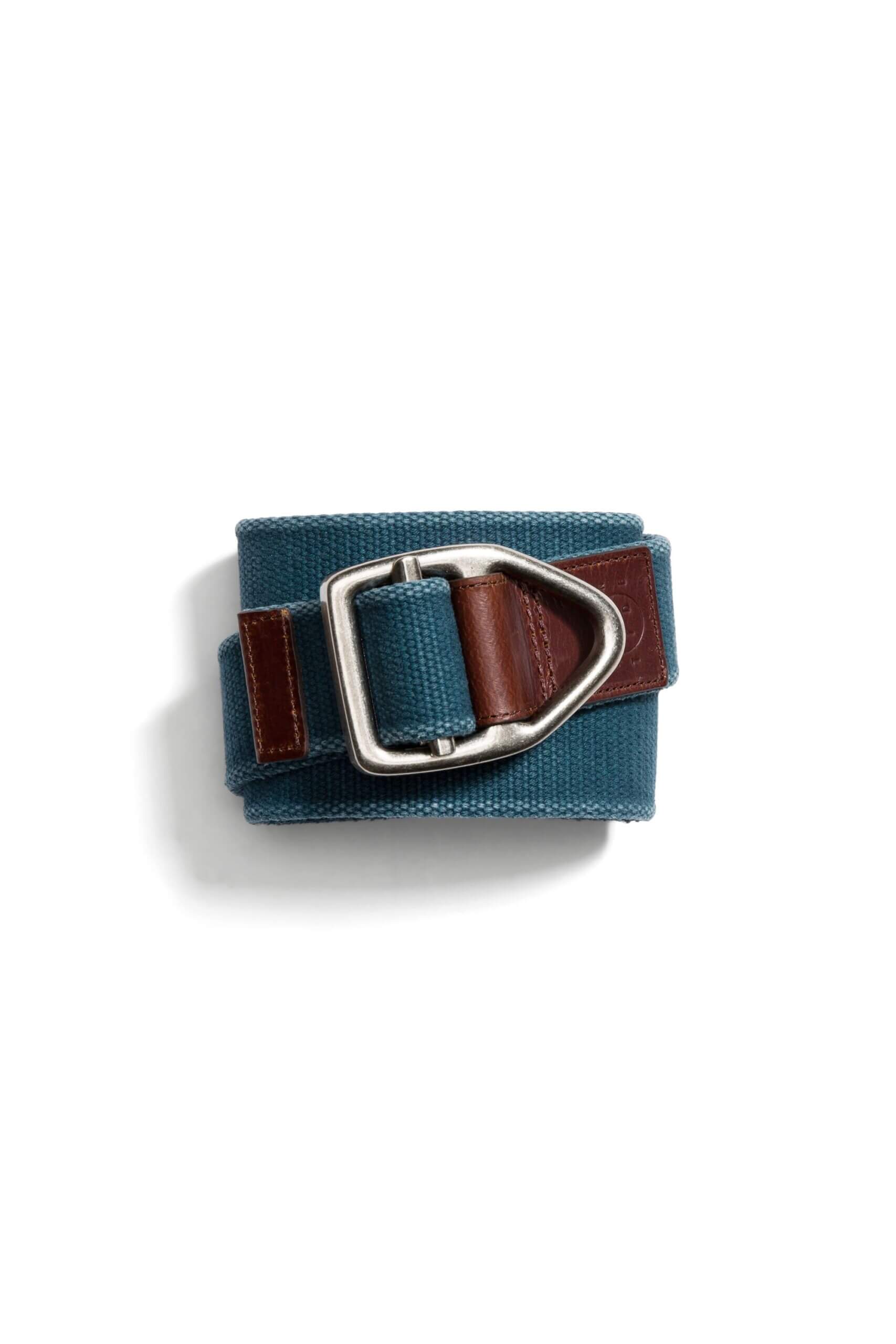 Stitch Fix men’s teal belt with brown leather accents and silver hardware.