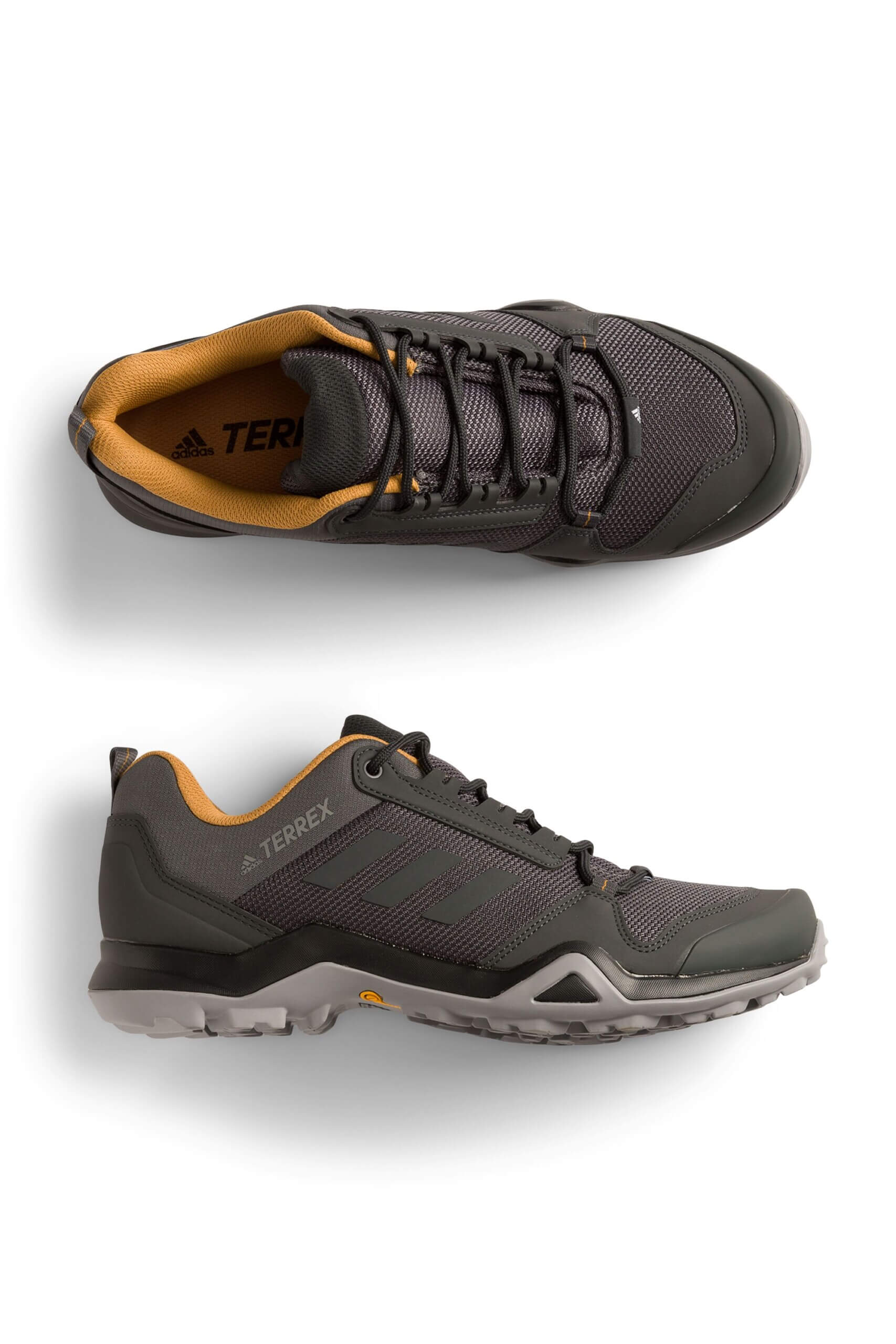 Stitch Fix men’s neon yellow, white and black gorpcore sneakers.