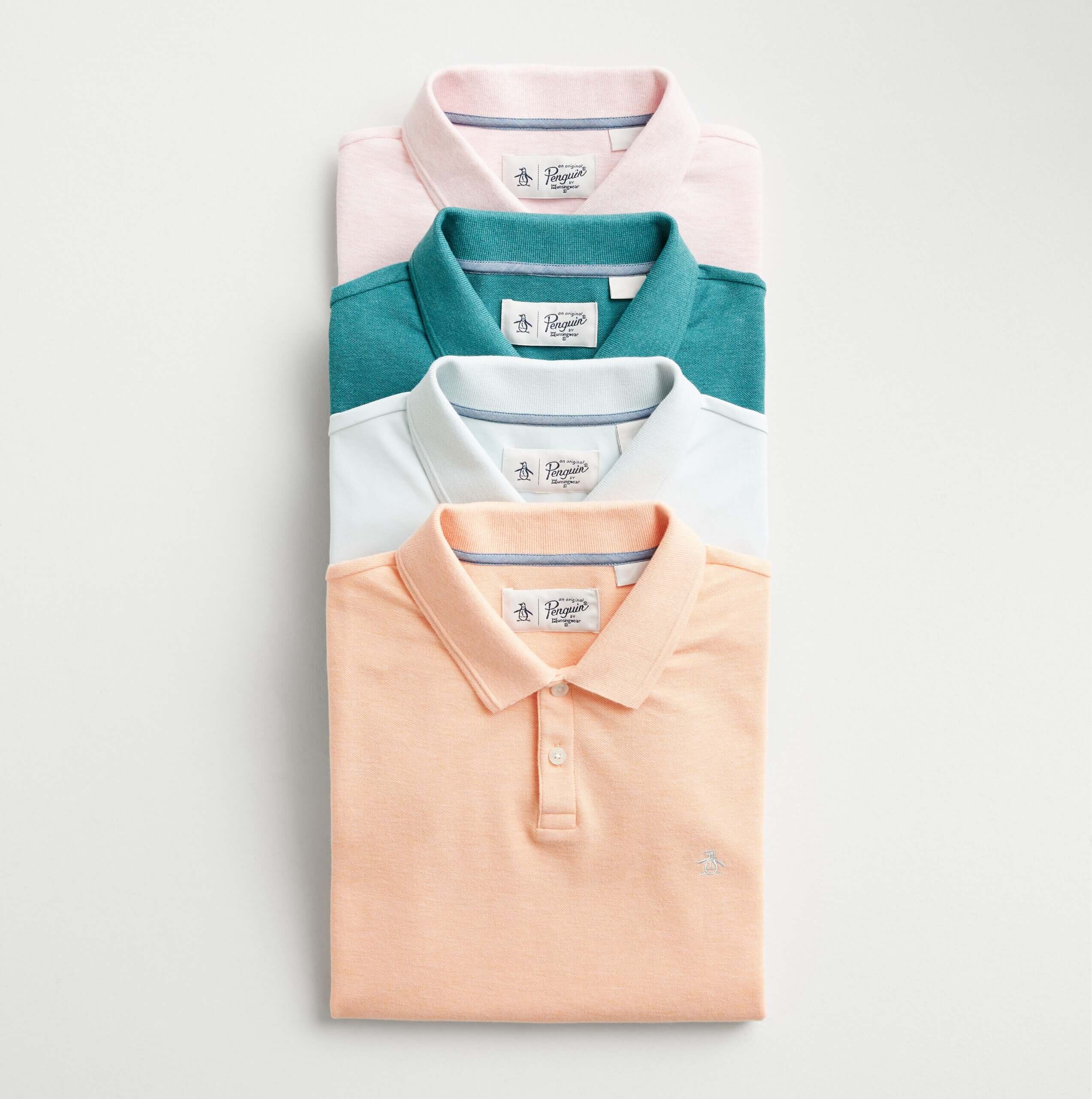 Stitch Fix men’s polo shirts in a variety of colors including peach, white, teal green and pink.