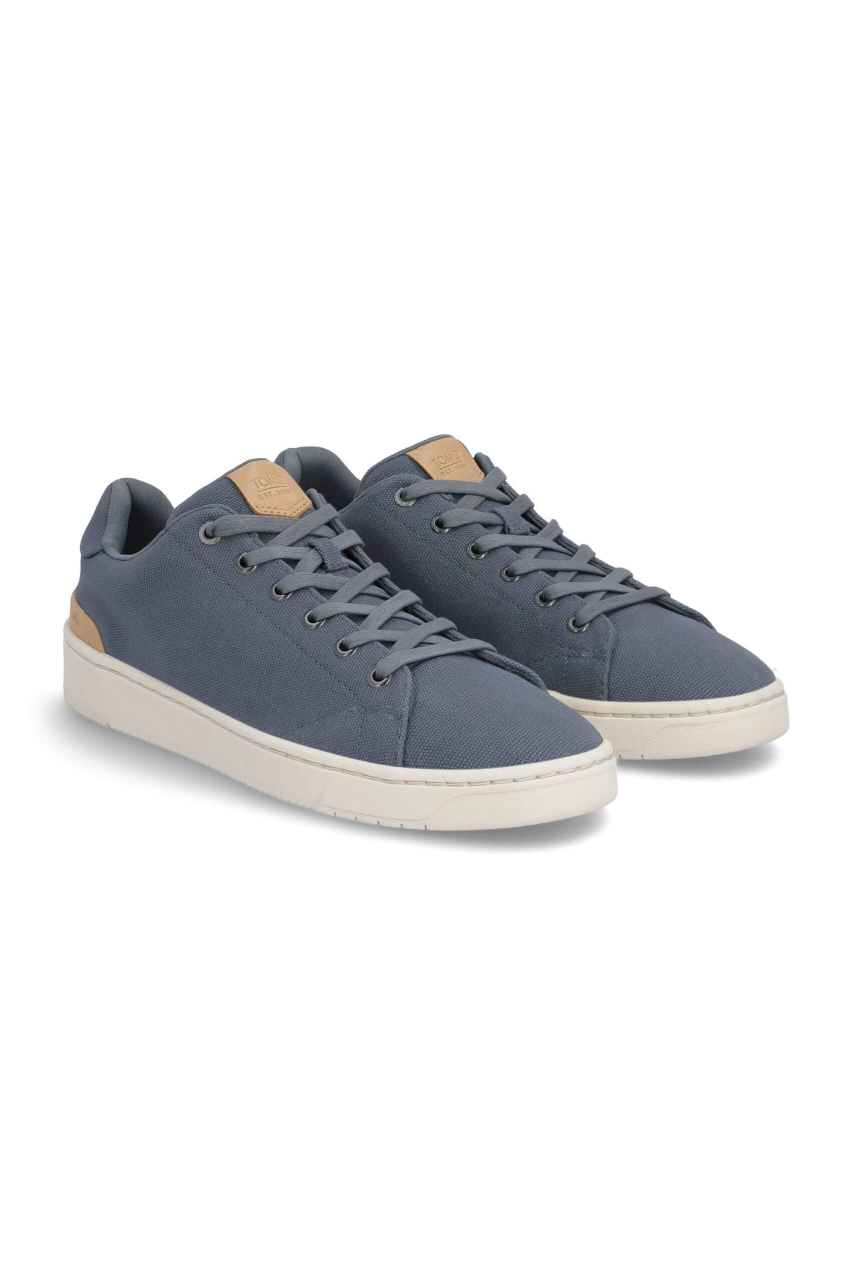 Stitch Fix men’s navy and tan suede sneakers with off-white soles.