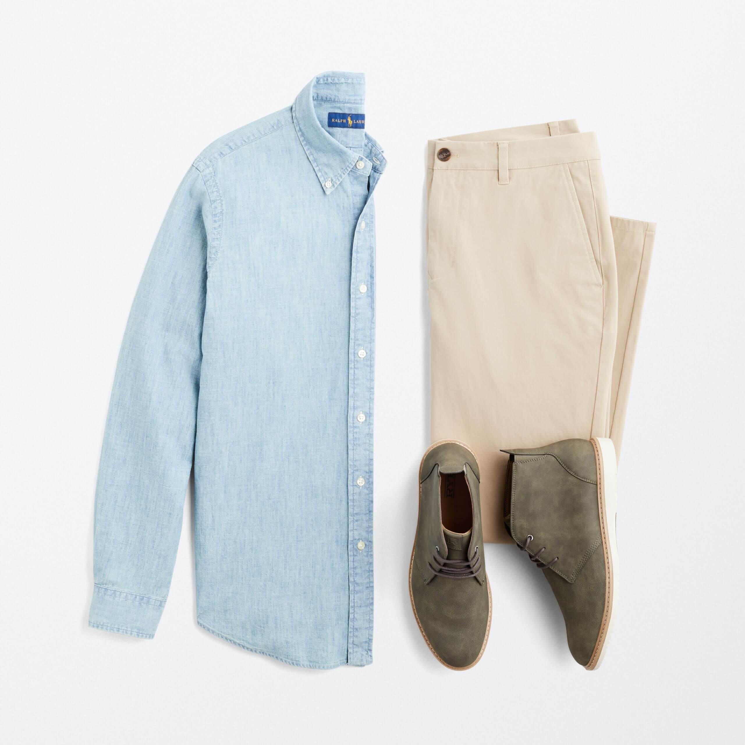 Stitch Fix men’s graduation outfit featuring a blue button-down, beige chinos pants and green suede chukkas.