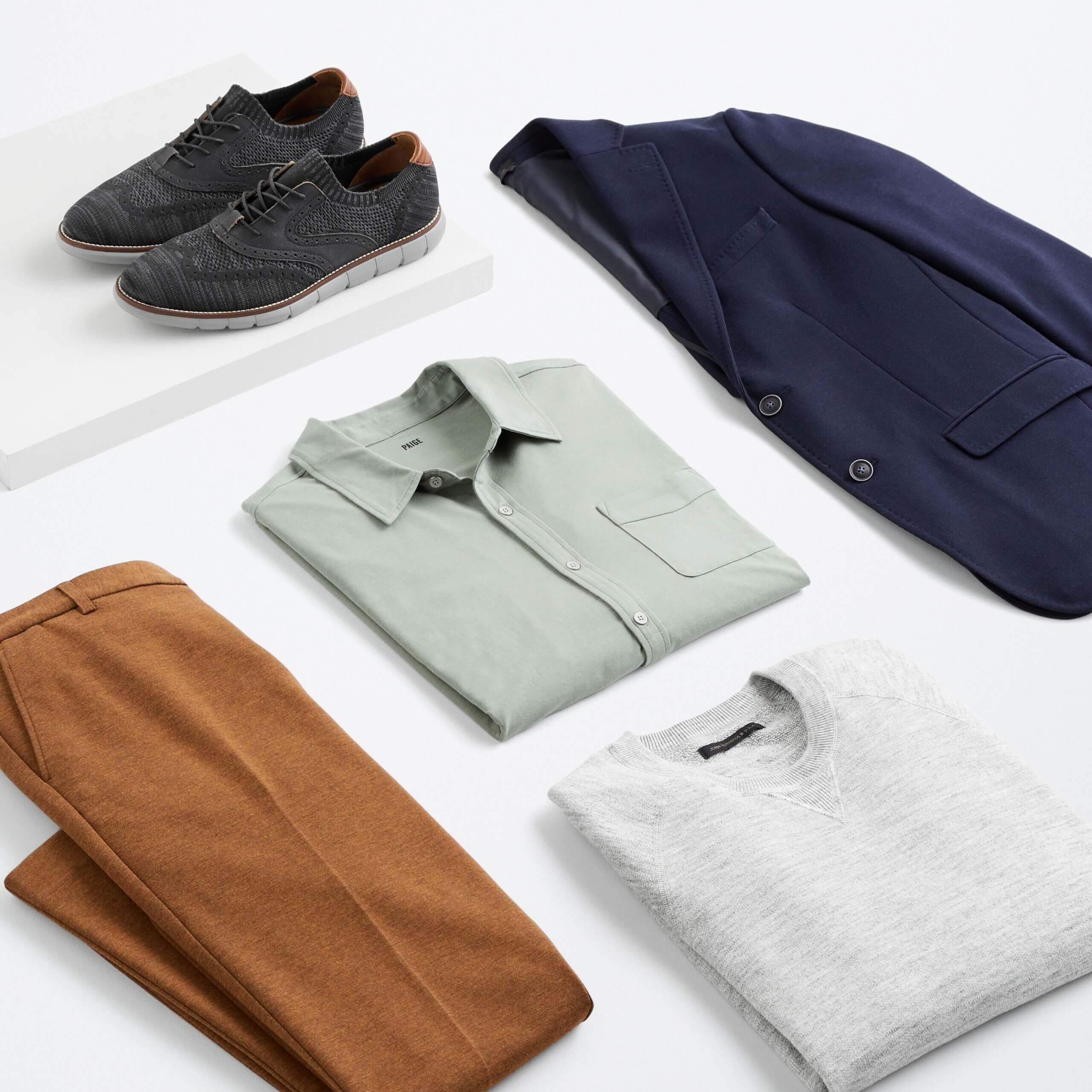 Stitch Fix men’s wedding attire outfit with brown dress pants, green shirt, grey sweater, navy blazer and black shoes.
