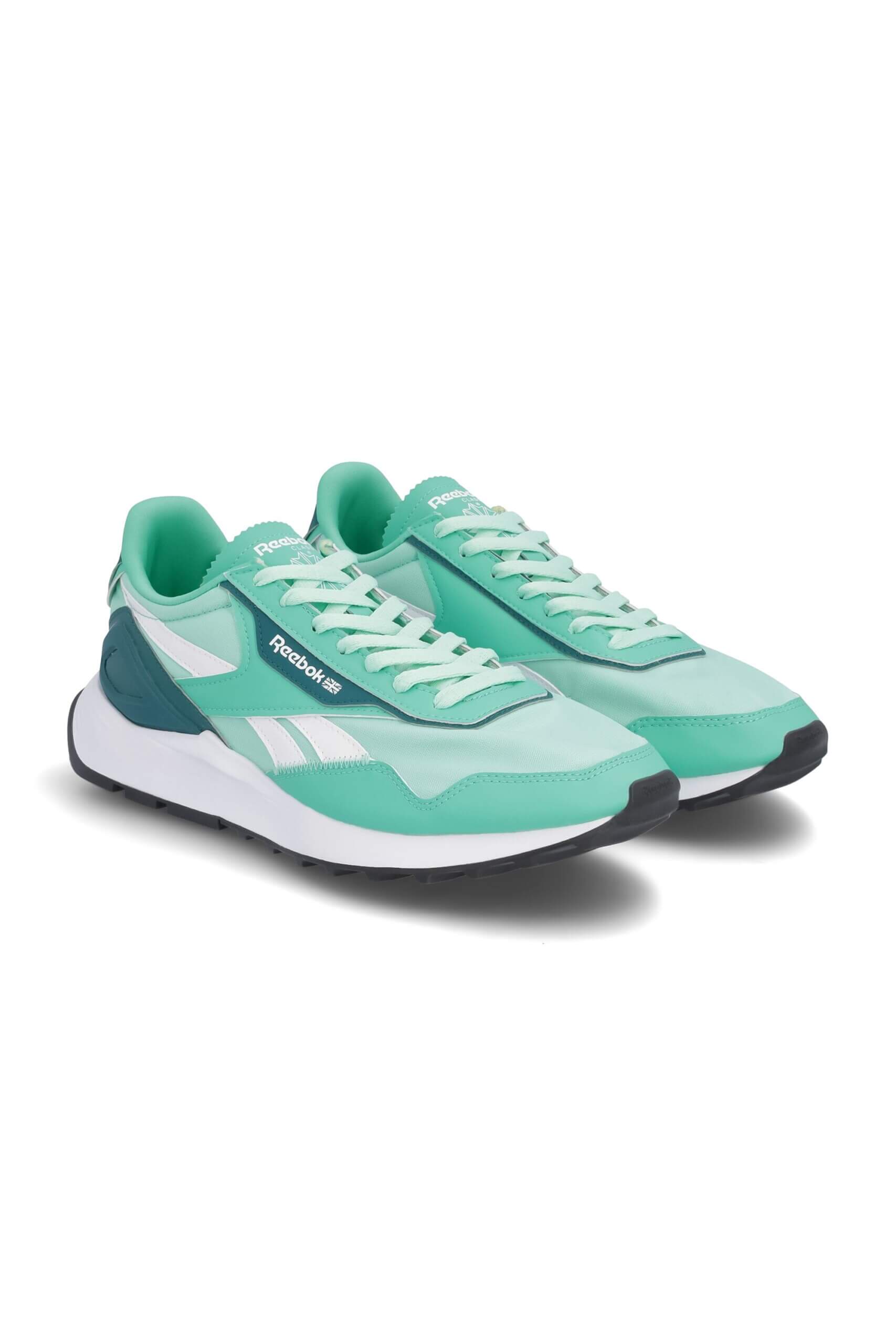 Stitch Fix men’s teal green, navy, and white sneakers.
