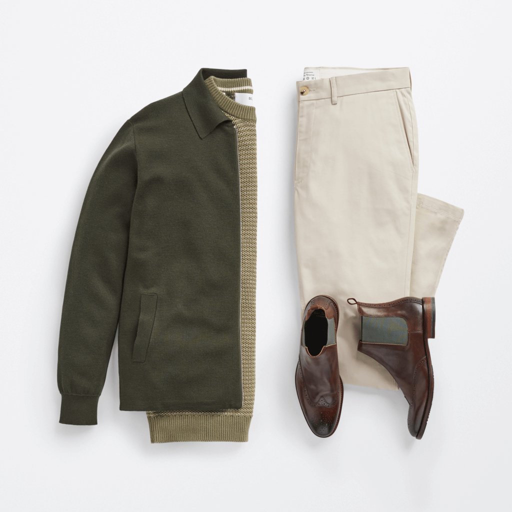 Stitch Fix Men’s laydown cardigan outfit with an olive shirt, olive cardigan, light grey pants and dark brown boots.