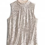 Stitch Fix women’s silver sequin mock-neck sleeveless blouse.