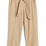 Stitch Fix women’s tan trousers with a belted waist.