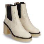 Stitch Fix women's grey lug-sole boots with sherpa fabric at ankle.