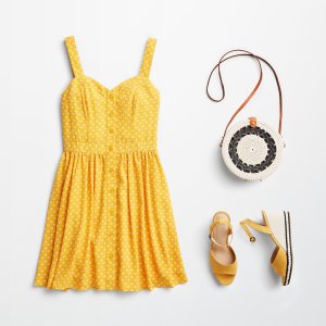 Stitch Fix women’s outfit laydown featuring yellow button front dress, round crossbody woven handbag and yellow wedges.