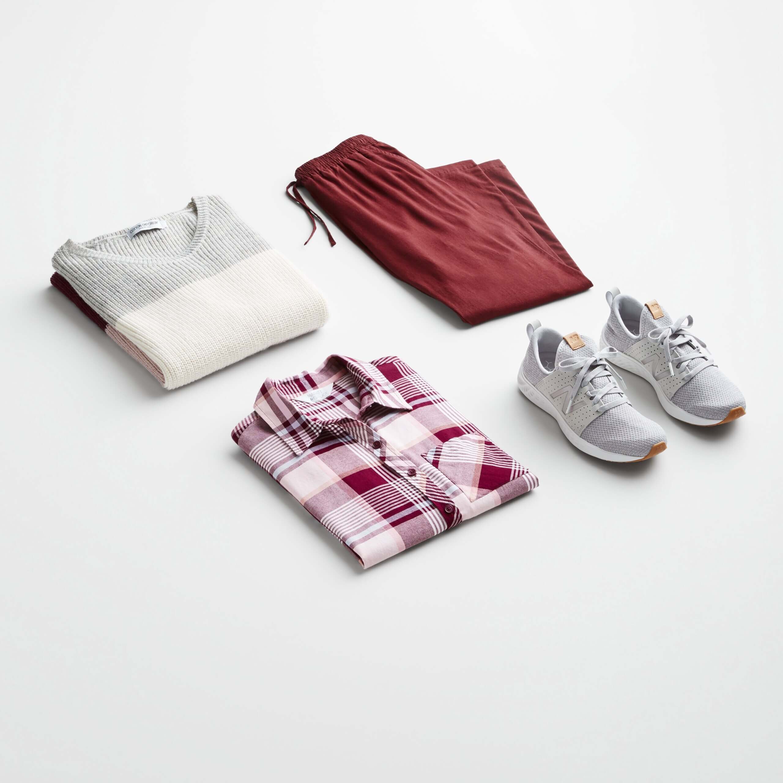 Stitch Fix Women’s outfit featuring burgundy joggers, plaid button-down shirt, colorblock pullover and grey sneakers.