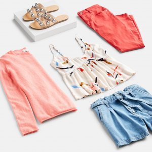 Stitch Fix women's 4th of July outfit laydown featuring red, white and blue printed tank, blue denim shorts, coral sweater, red pants and sandals.