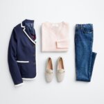Stitch Fix Women’s outfit featuring jeans, pink crewneck sweater, navy blazer with white piping and off-white loafers.