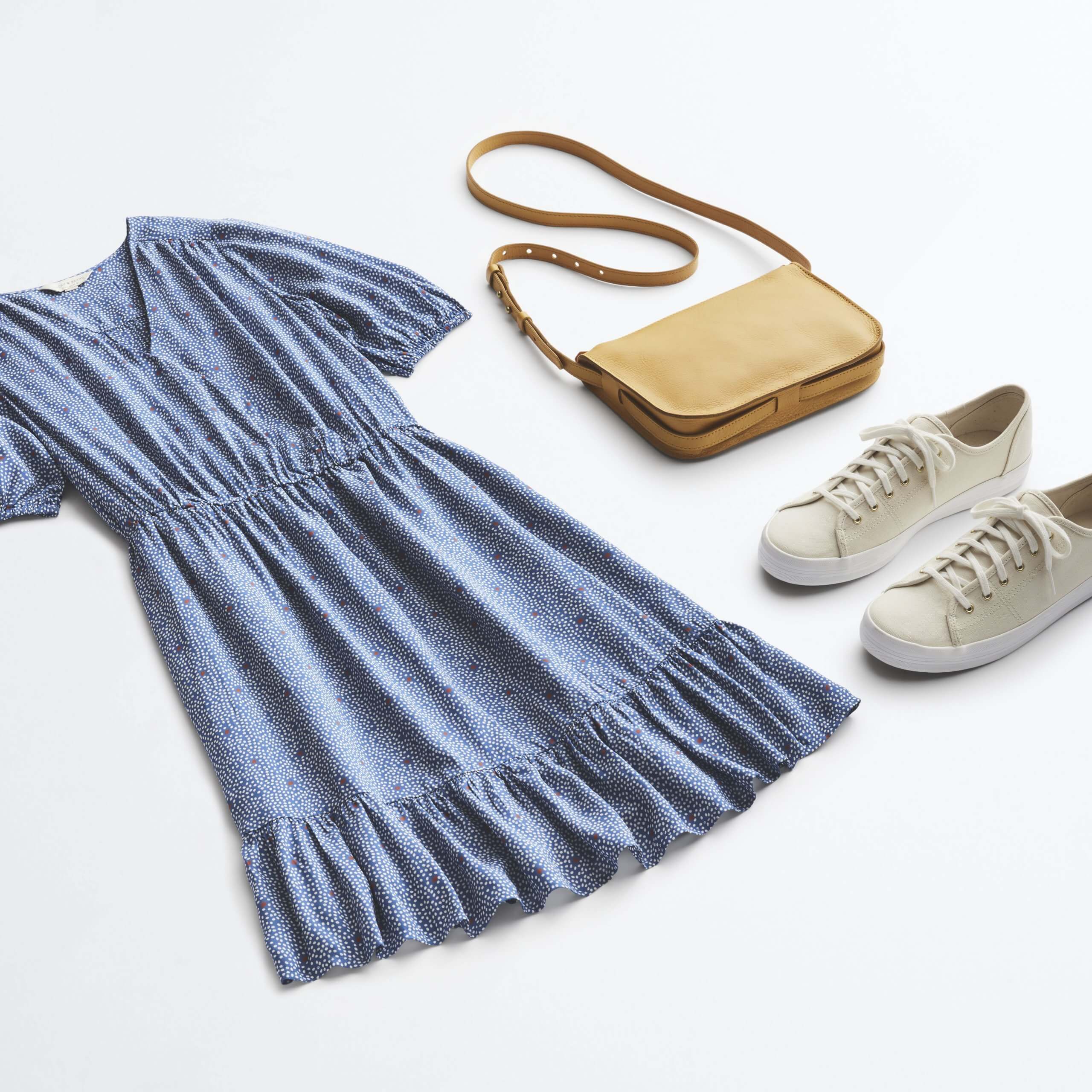 Stitch Fix women’s 4th of July outfit laydown featuring red, white and blue polka dot dress, lace-up sneakers and yellow bag.