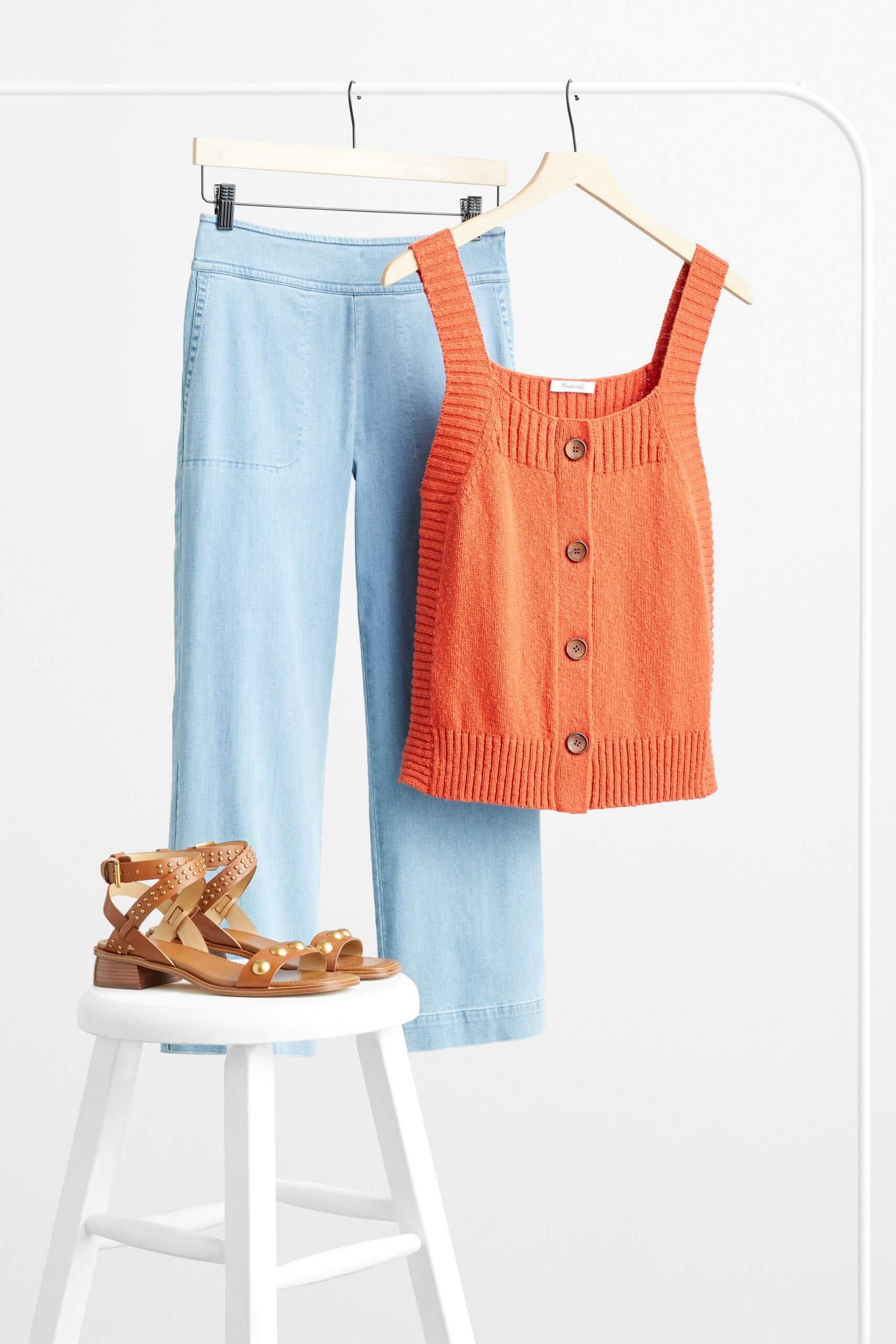 Stitch Fix women’s cropped wide-leg jeans with orange button front tank top and brown sandals.