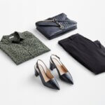 Stitch Fix Summer Cocktail Attire olive animal-print buttoned blouse, black pants, black heels and black crossbody bag.