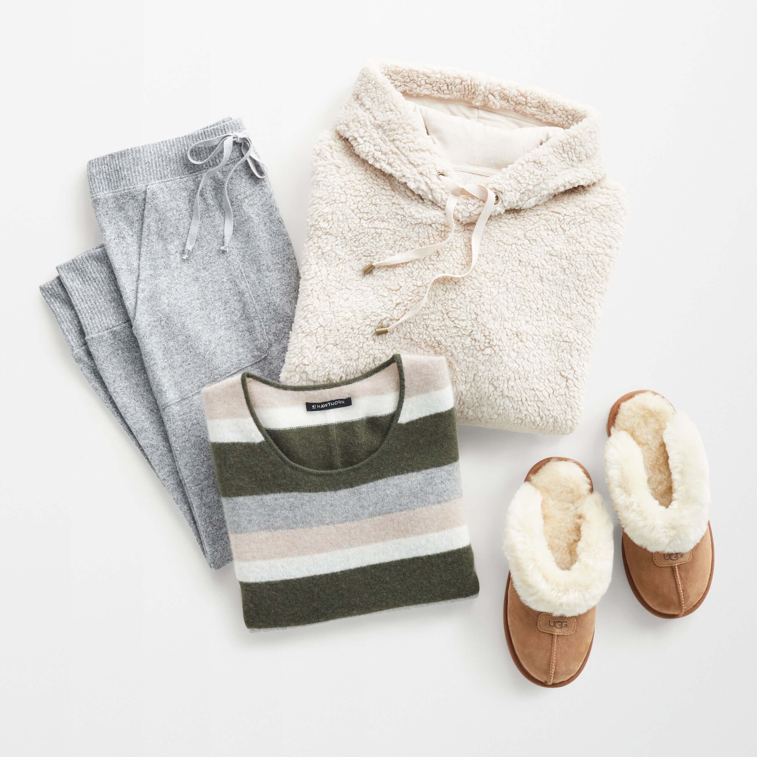 Stitch Fix Women’s Outfit featuring striped T-shirt, grey joggers, sherpa hooded pullover and fuzzy slippers.
