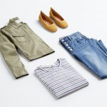 Stitch Fix outfit laydown featuring olive utility jacket, mustard flats, button-fly skinny jeans and a striped shirt.