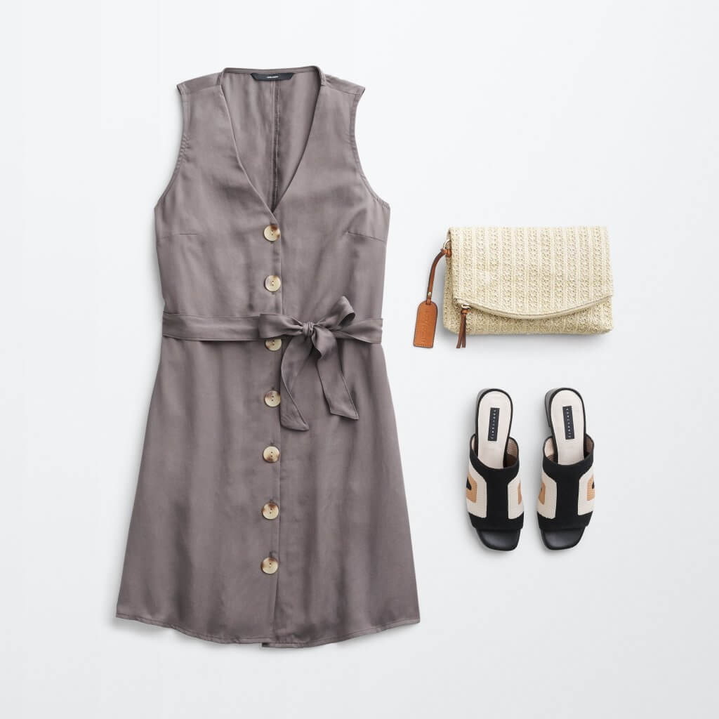 Stitch Fix women’s laydown featuring brown tie-front button-down dress, woven cognac fold over clutch and black, white and tan peep-toe heels.
