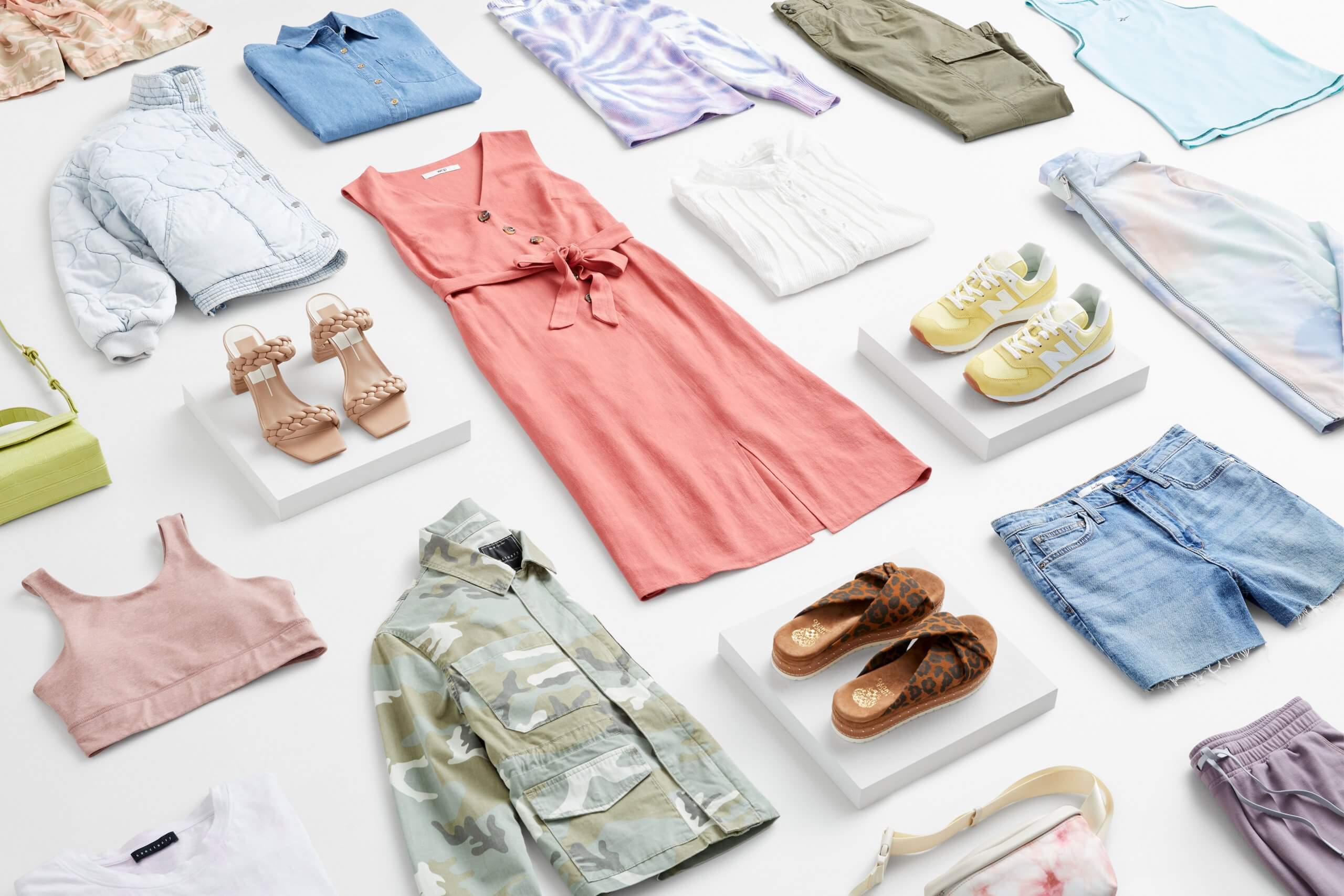 Stitch Fix women’s sustainable styles lay down featuring loungewear, sundresses, jackets and shoes.