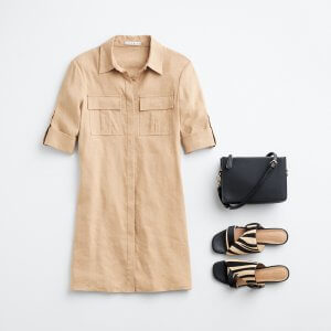 Stitch Fix women’s outfit laydown featuring khaki shirt dress, black crossbody bag and black and tan zebra print sandals.